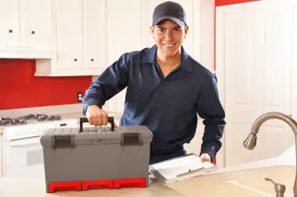 Licensed Iceberg Home Services plumber with tool box